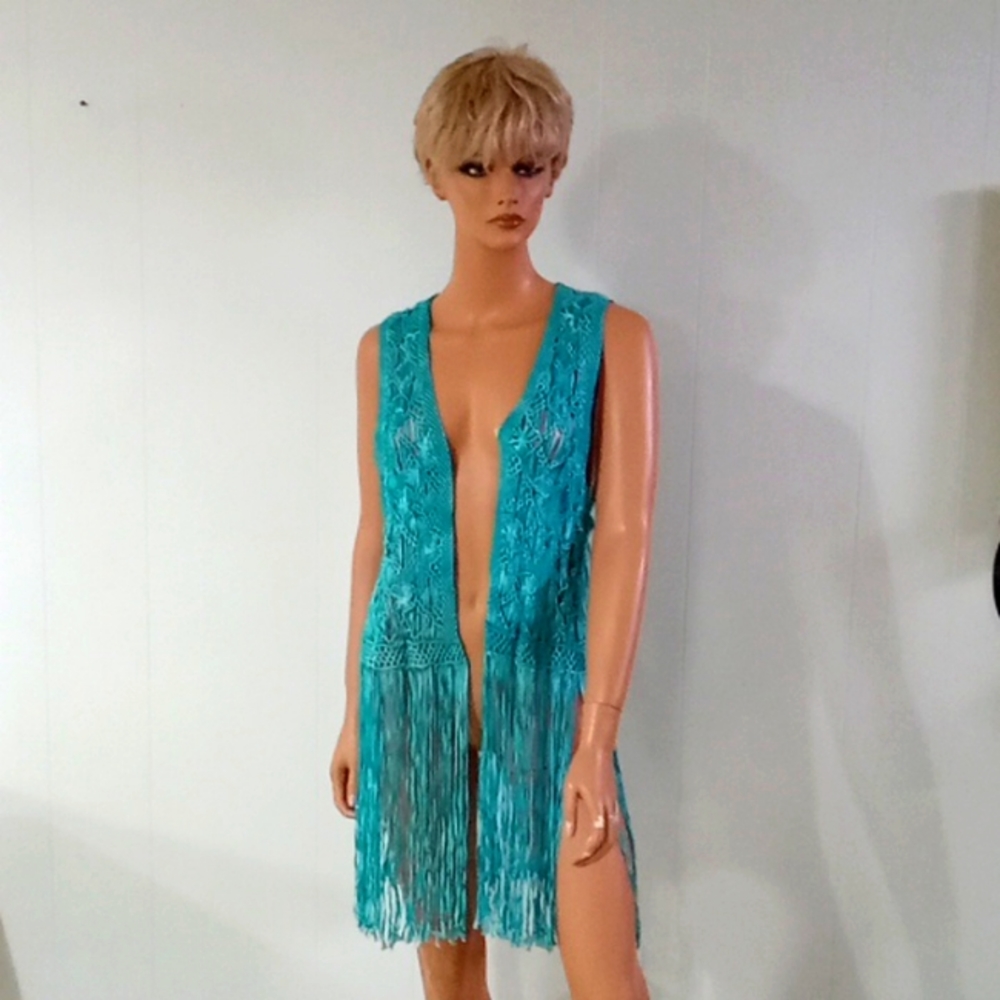 Pat Dahnke turquoise fringed cord vest